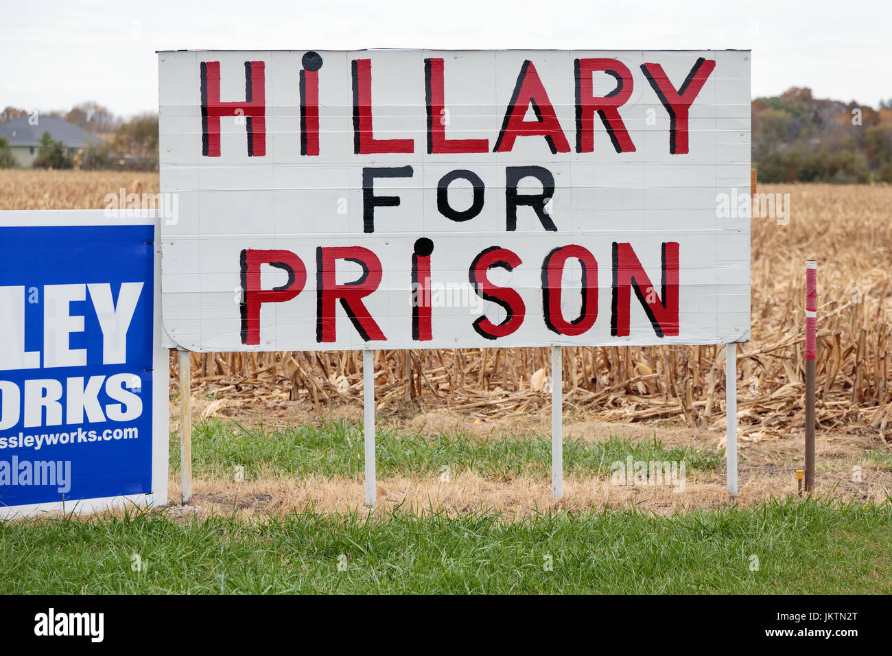 "Hillary For Prison" and Republican campaign signs along US Route 34