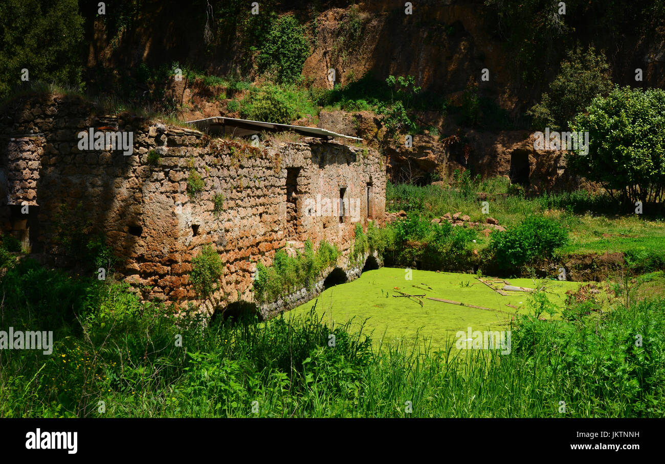 Ancient ruins of the old water mill of the small town of Sutri, near ...