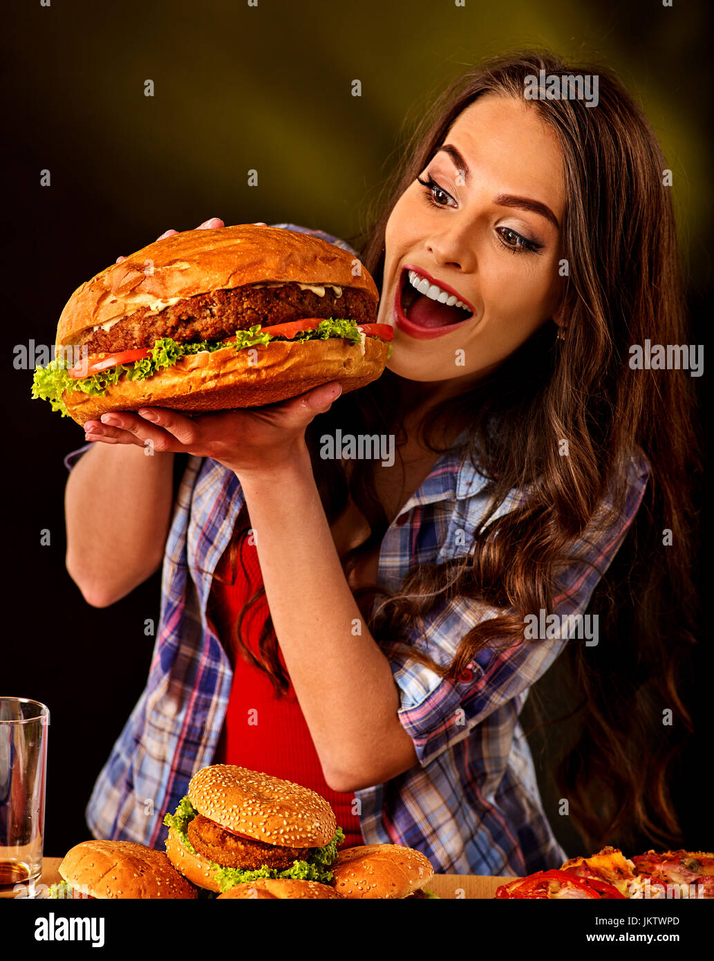Female Eating Big Burger 