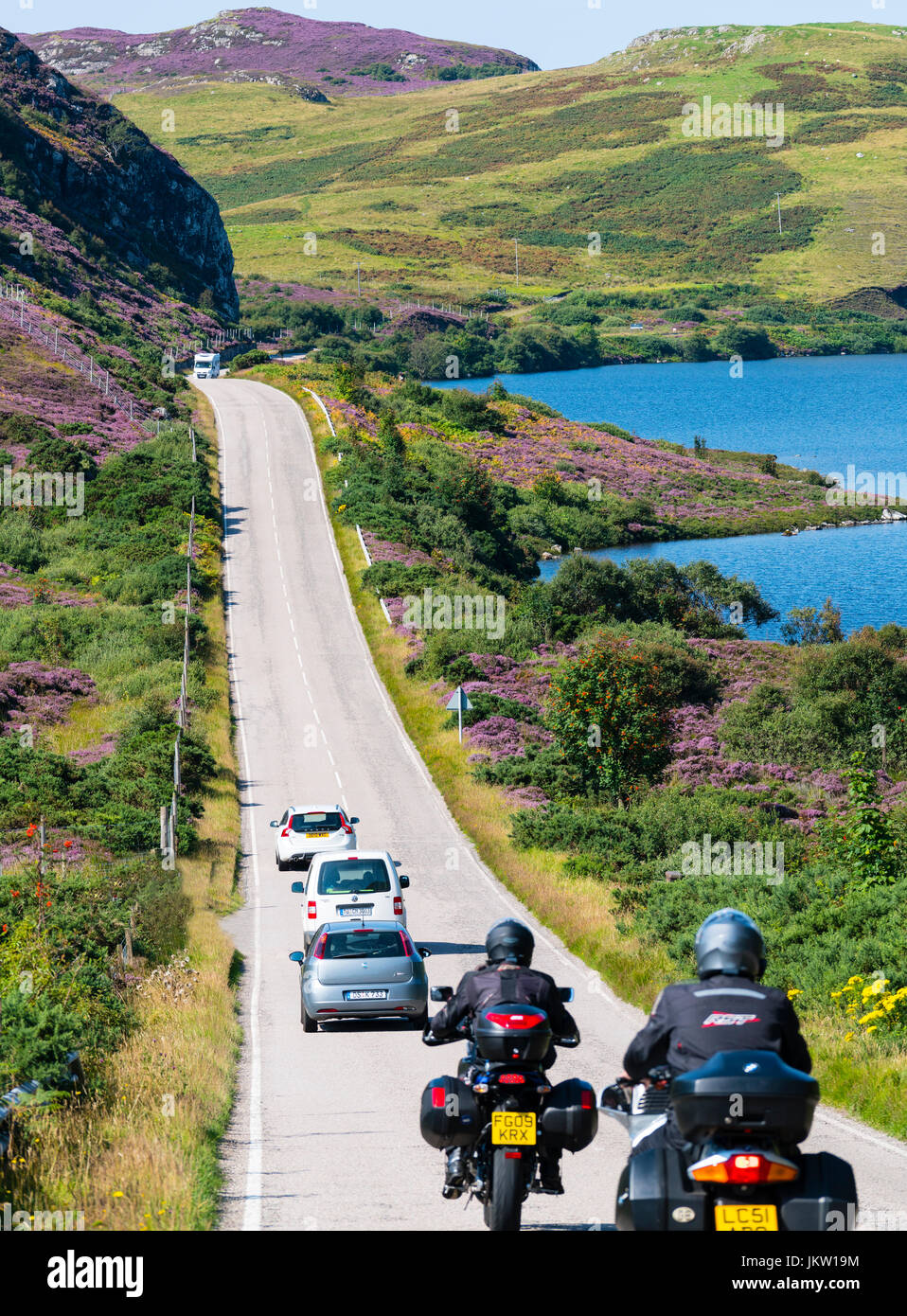 Traffic on highway in north of Scotland part of North Coast 500 tourist route Stock Photo