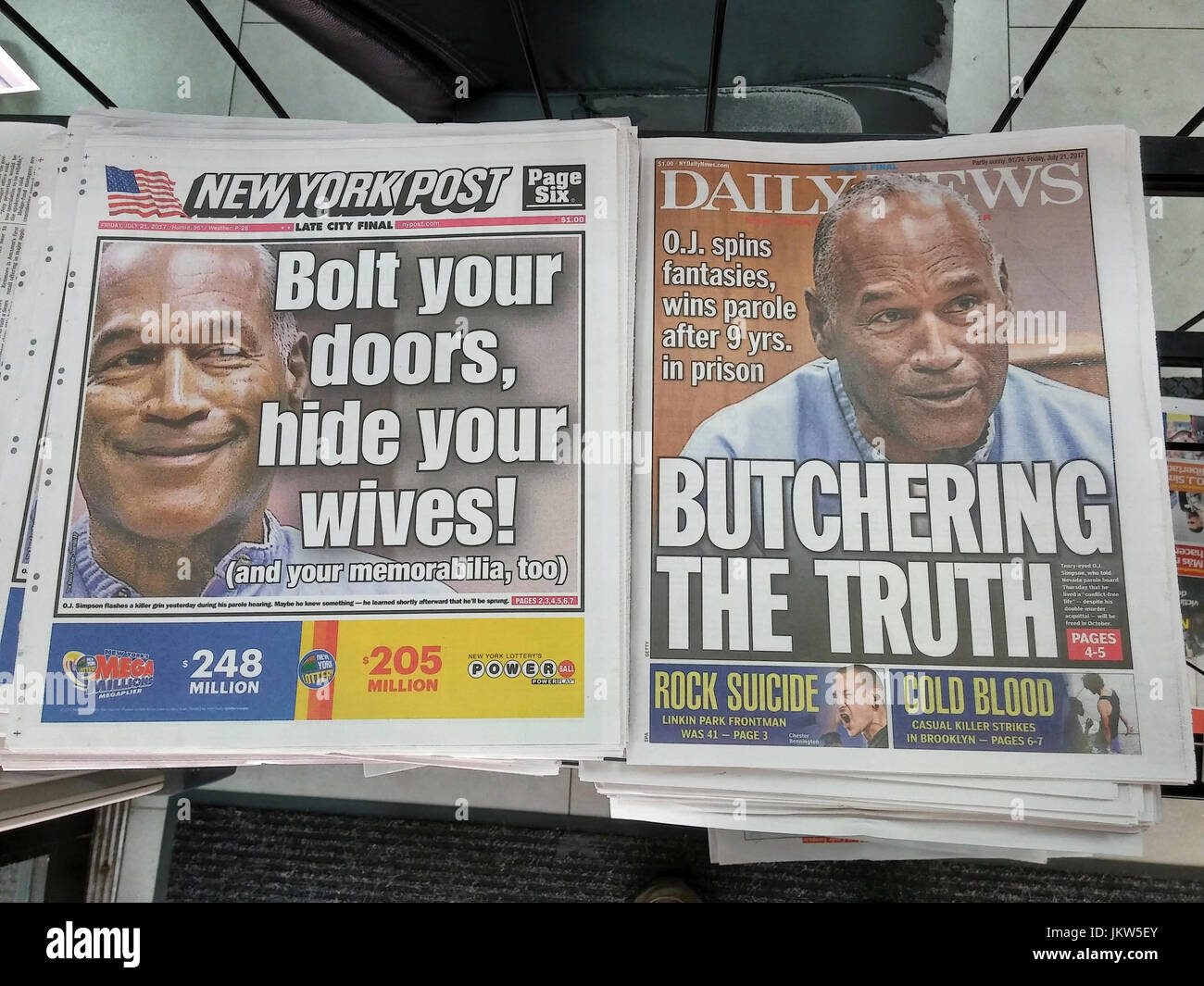 The headlines of New York tabloid newspapers on Friday, July 21, 2017 report O.J. Simpson being granted parole after 9 years in prison. (© Richard B. Levine) Stock Photo