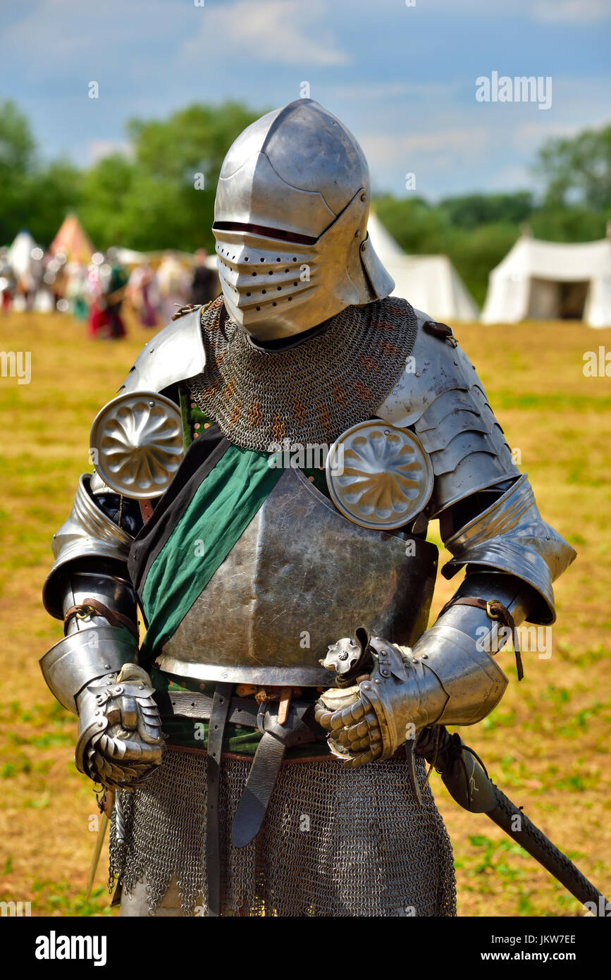 Single mediaeval knight in shining armour on field of battle of Tewkesbury in 1471, re-enactment Stock Photo