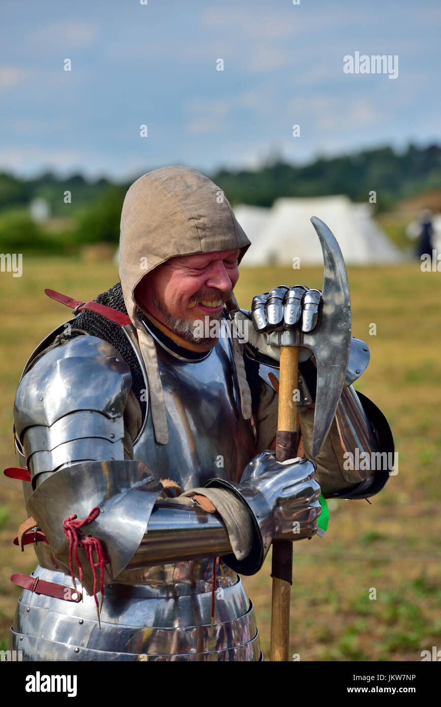 https://c8.alamy.com/comp/JKW7NP/portrait-of-mediaeval-re-enactor-in-armour-suit-with-helmet-off-resting-JKW7NP.jpg
