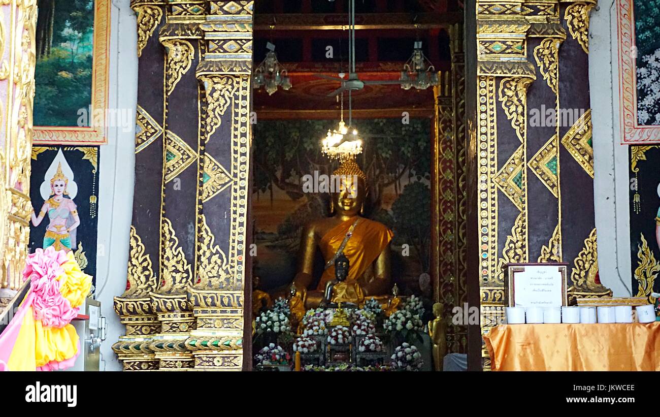 Golden Buddha image statue in Thai temple in Chiang Mai, Thailand Stock ...