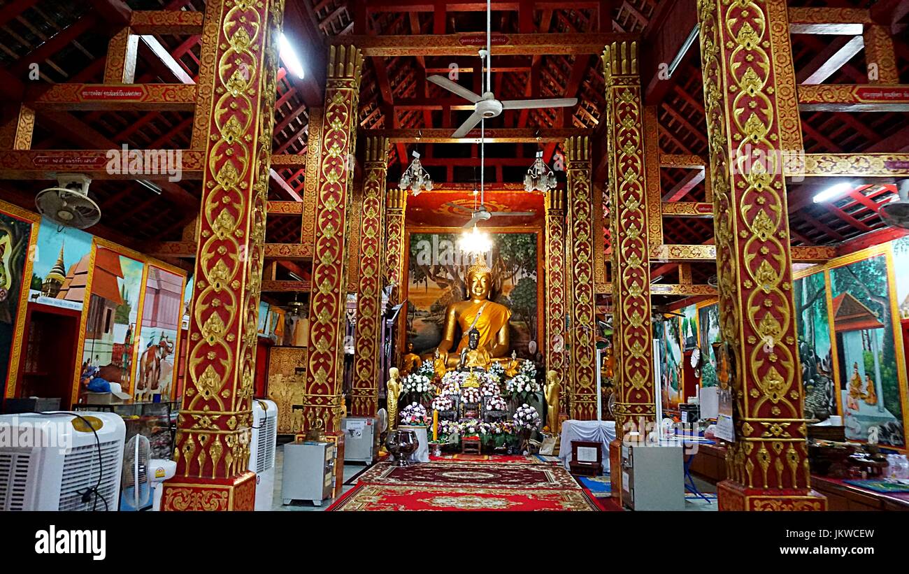 Golden Buddha image statue in Thai temple in Chiang Mai, Thailand Stock ...