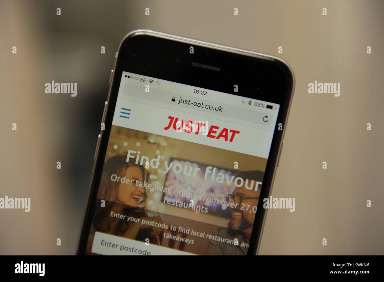 The Just Eat website on a phone Stock Photo