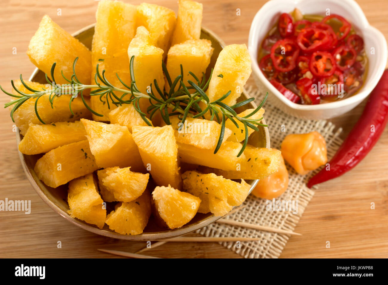 Brazilian food mandioca frita. Deep fried cassava root. Stock Photo