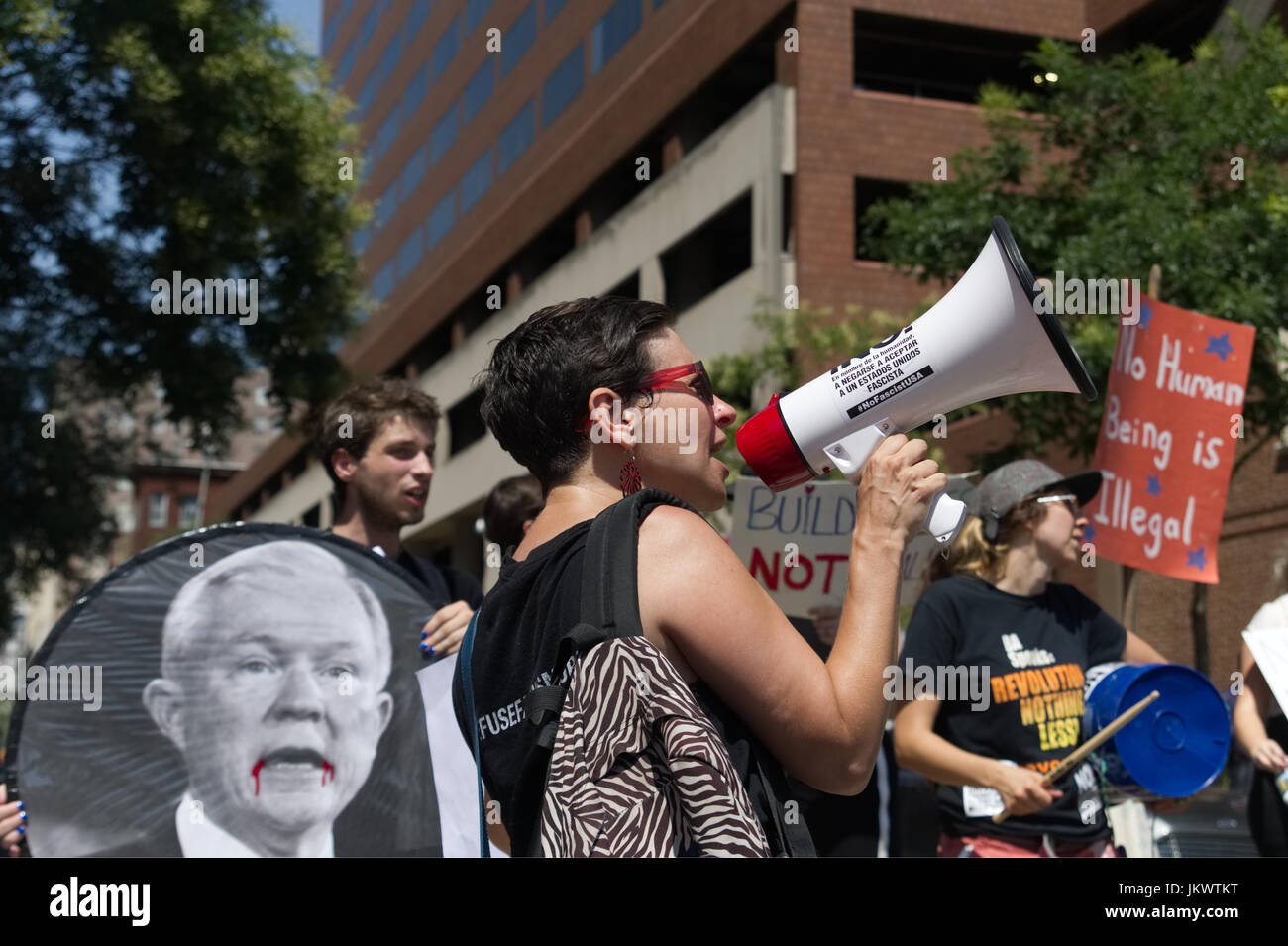 Protestors stand outside as US Attorney General Jeff Sessions delivers a speech outlining the Department of Justice policy regarding Sanctuary Cities  Stock Photo