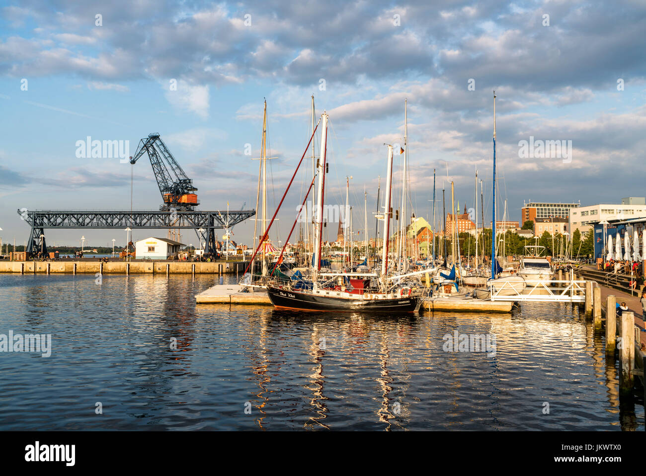 Port of Rostock , Sailing boats, harbor crans, Mecklenburg-Vorpommern, Stock Photo
