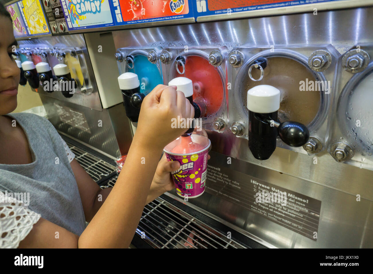 A worker fills a Slurpee in a 7Eleven store in New York on Tuesday
