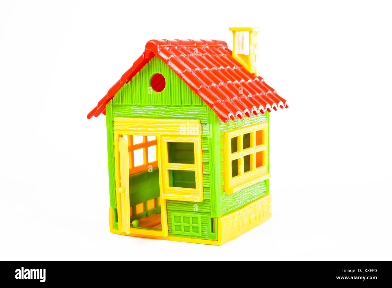 Green toy house on isolated white background Stock Photo - Alamy