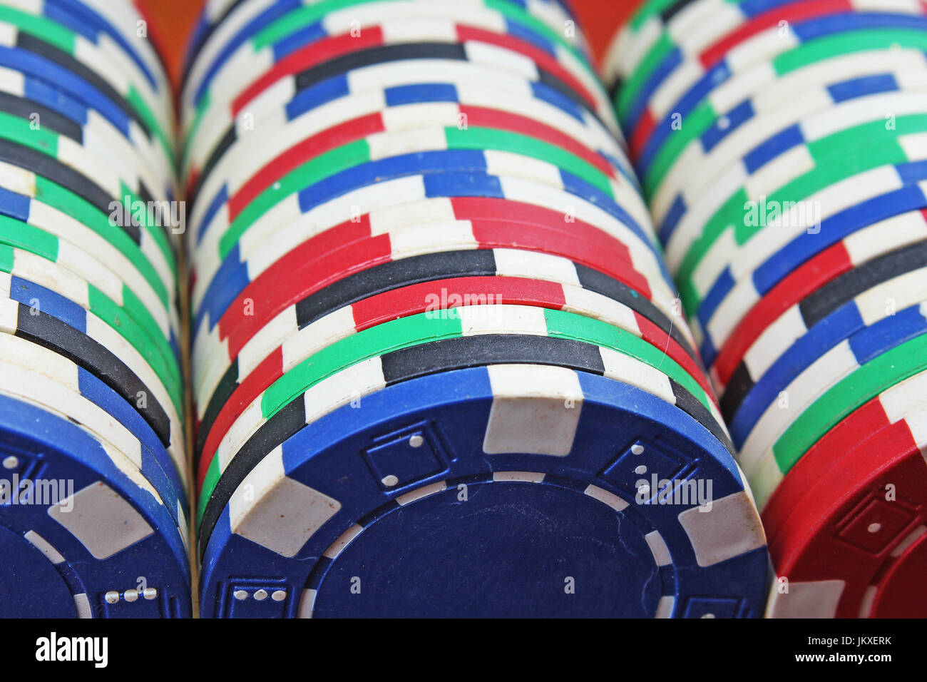 Casino poker money chips texture. Stack of poker chips as background