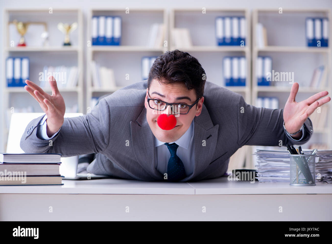 Work Cloan Clown businessman working in the office Stock Photo - Alamy