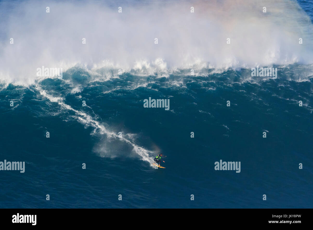 Big wave surfing event. The biggest surfing waves in the world, at Praia do Norte beach, Nazare, Portugal, popularized by Garrett MacNamara Stock Photo