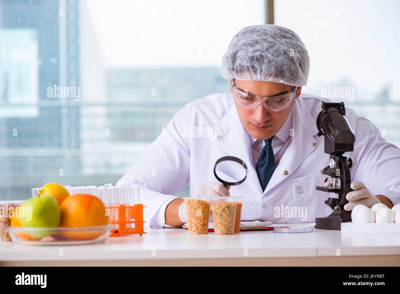 Nutrition expert testing food products in lab Stock Photo Alamy