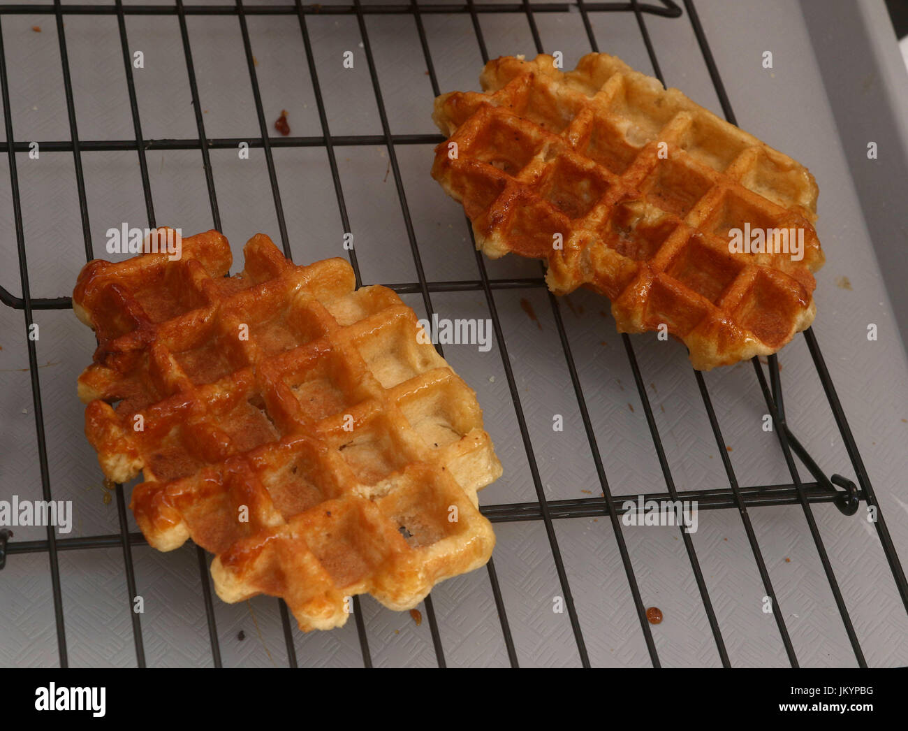 Belgian waffles on a grill Stock Photo Alamy