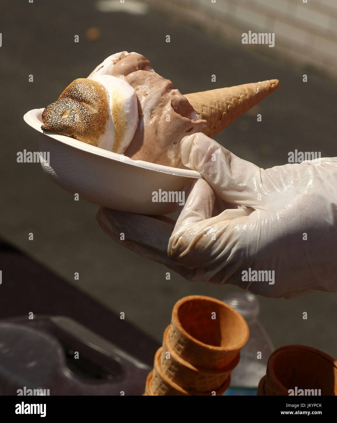 Ice cream cone made with chocolate ice cream and caramelized whipped