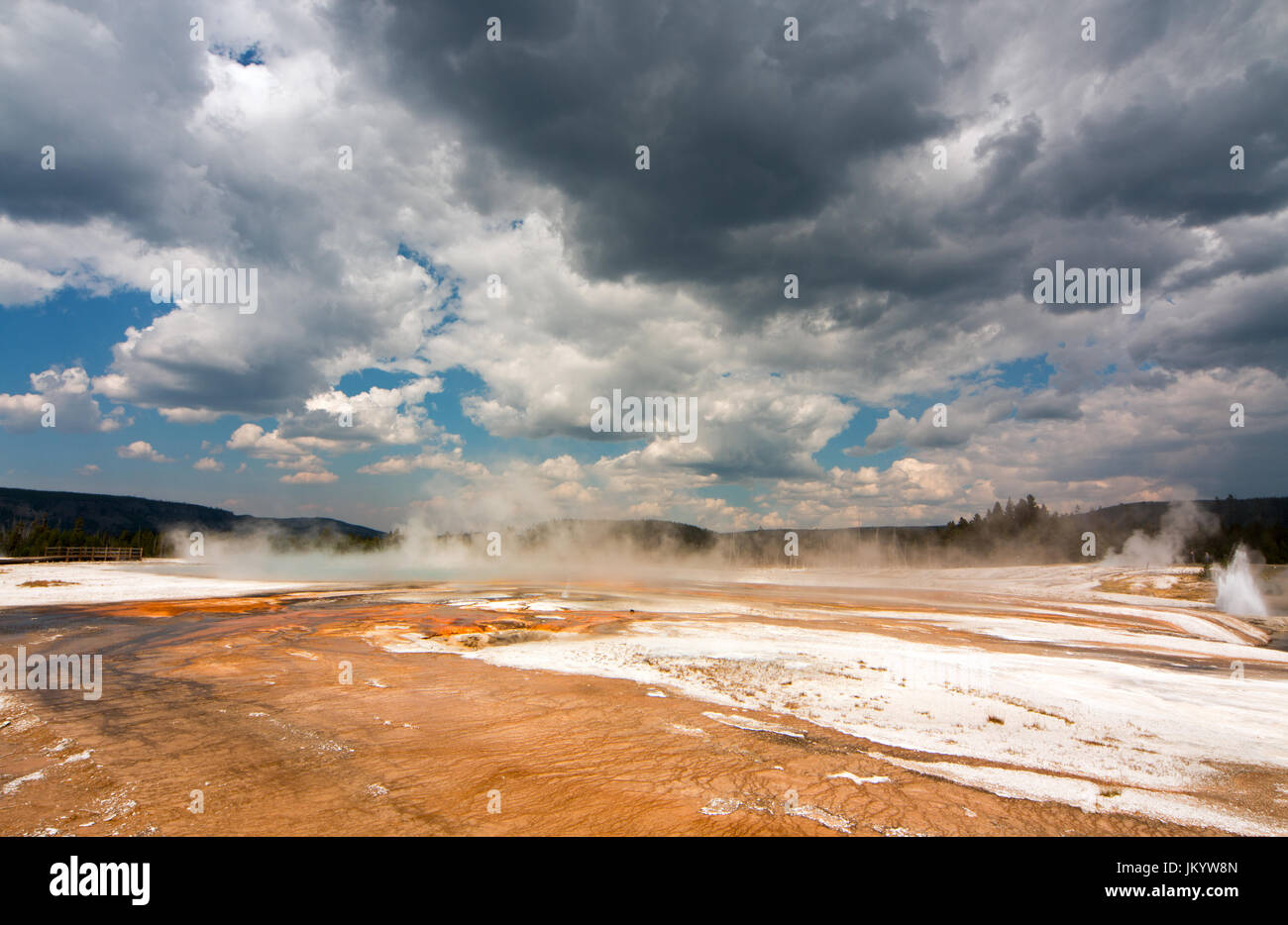 Rainbow Pool hot spring run off past the Cliff Geyser into Iron Spring Creek in Black Sand Basin in Yellowstone National Park in Wyoming United States Stock Photo