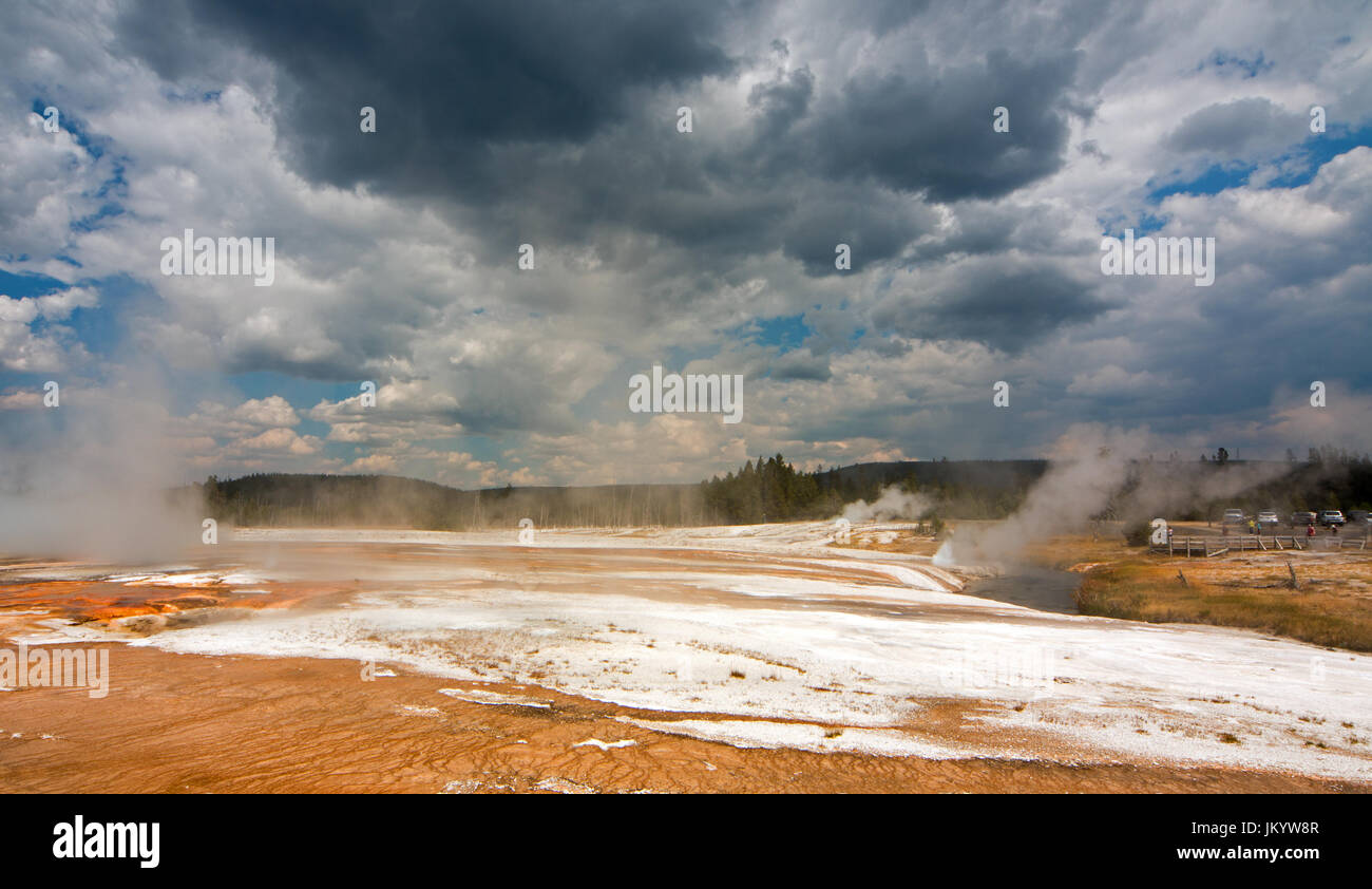 Rainbow Pool hot spring run off past the Cliff Geyser into Iron Spring Creek in Black Sand Basin in Yellowstone National Park in Wyoming United States Stock Photo