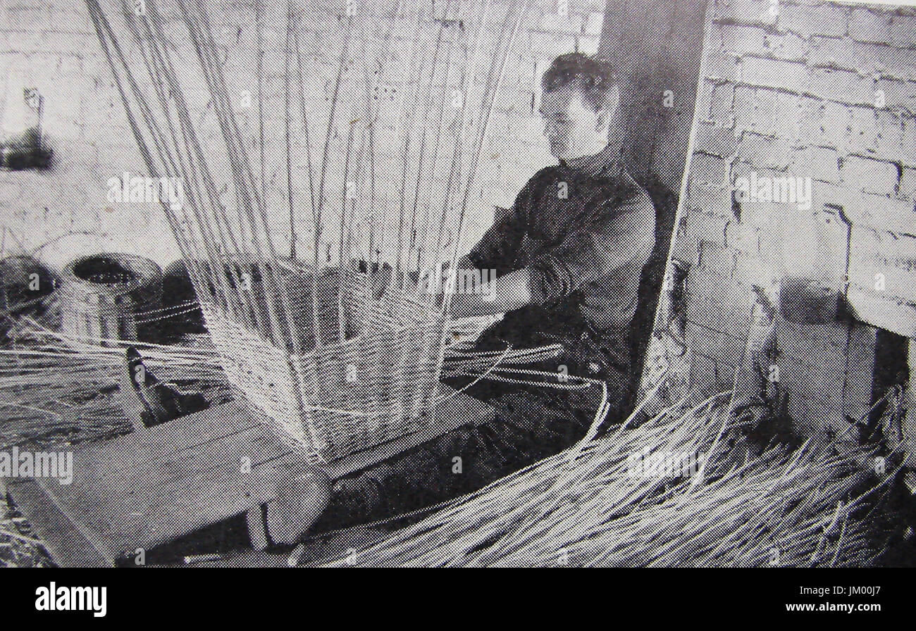 Cane  Basket Weaving by candlelight at Sedgemoor Somerset Stock Photo