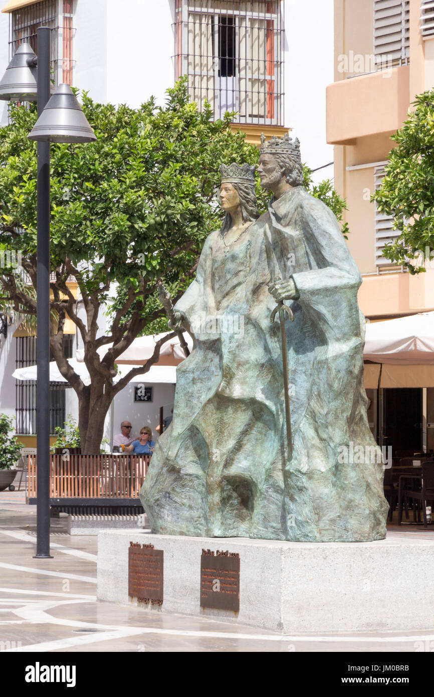 The statue of the Catholic King Ferdinand and Queen Isabella in Plaza de los Reyes Católicos, Fuengirola, Spain Stock Photo