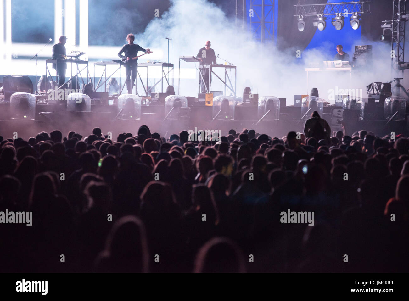 Guitarist and singer of electronic dance group hires stock photography