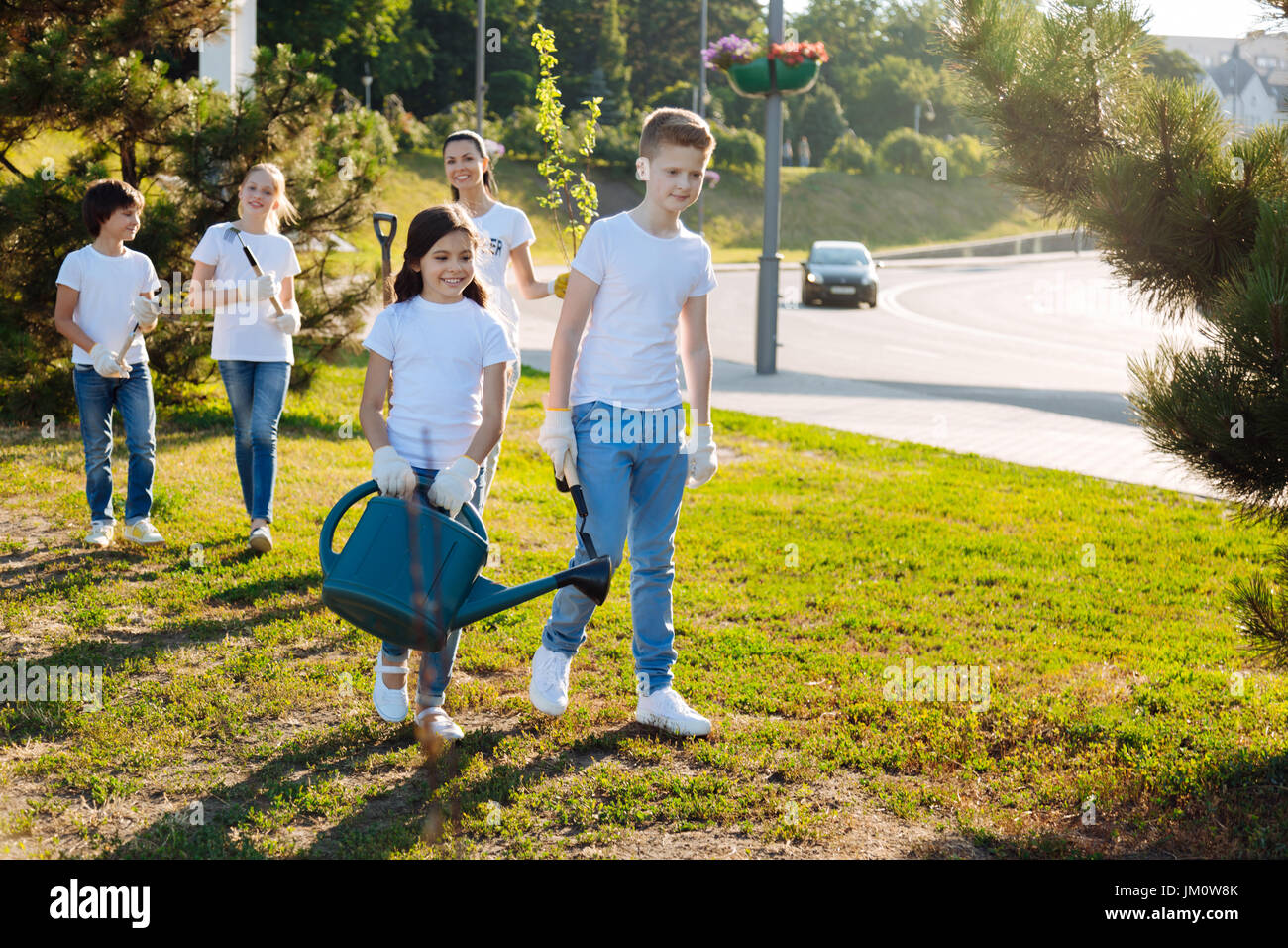 Delighted children doing their tasks Stock Photo - Alamy
