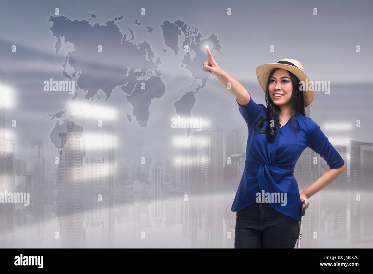 Beutiful asian woman touching travel destination on virtual screen over futuristic background Stock Photo