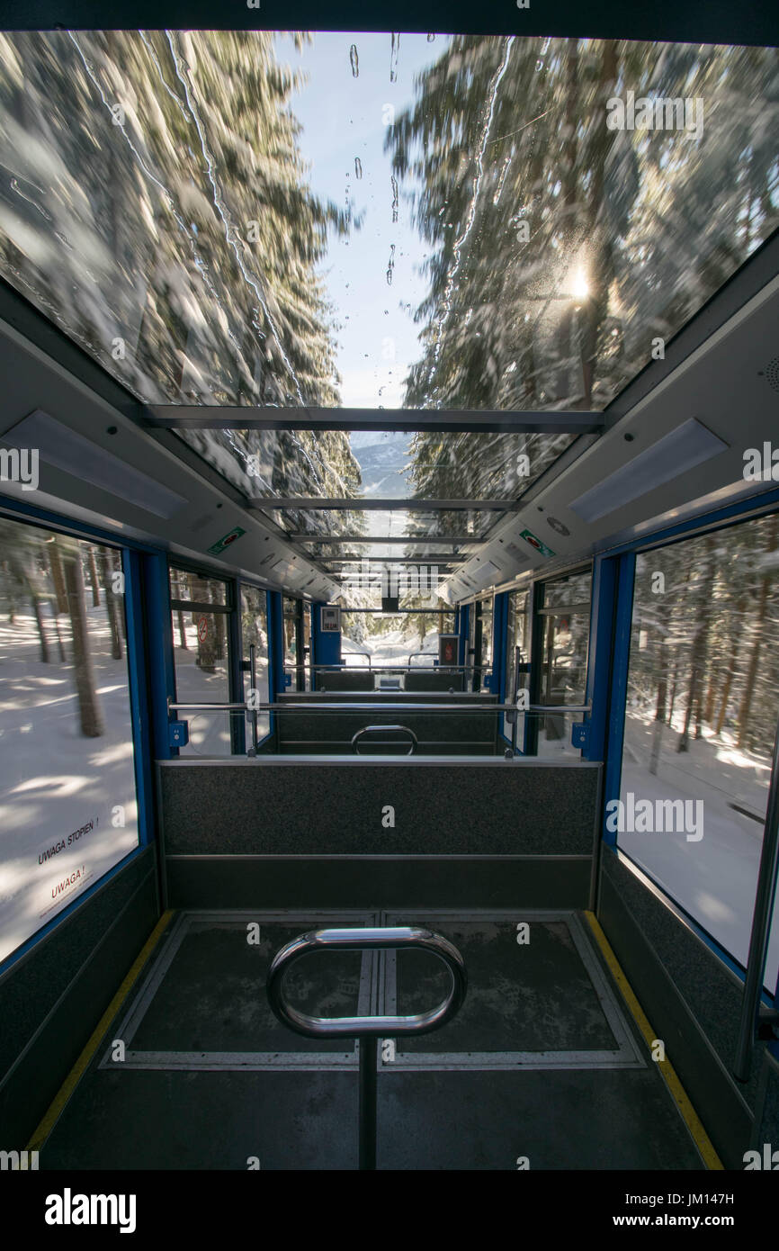 going down hill on a mountain tram at the Zakopane mountains in Poland Stock Photo