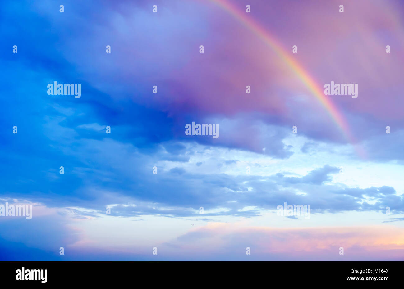Cumulus cloud rainbow hi-res stock photography and images - Alamy