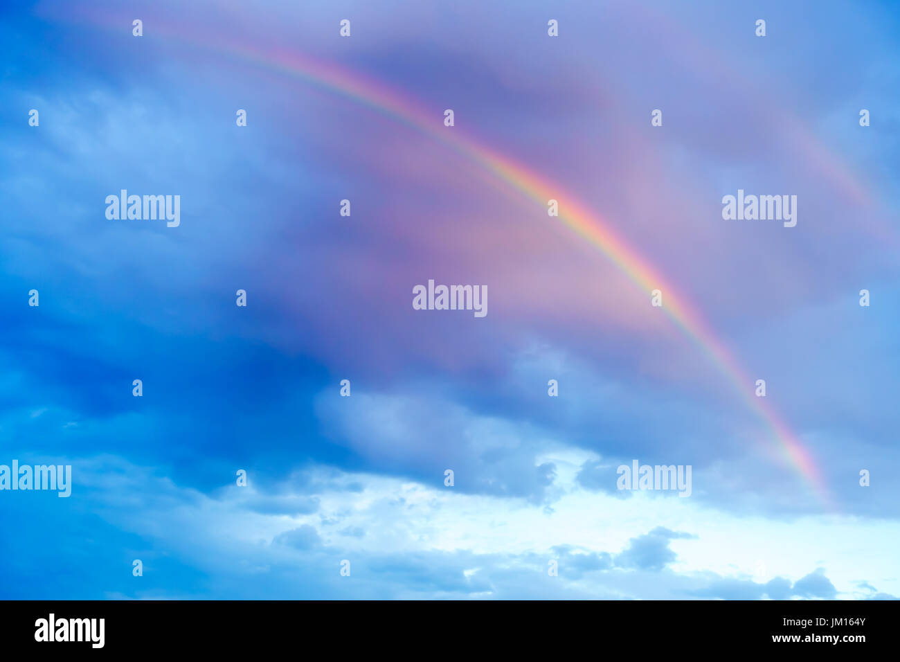Cumulus cloud rainbow hi-res stock photography and images - Alamy