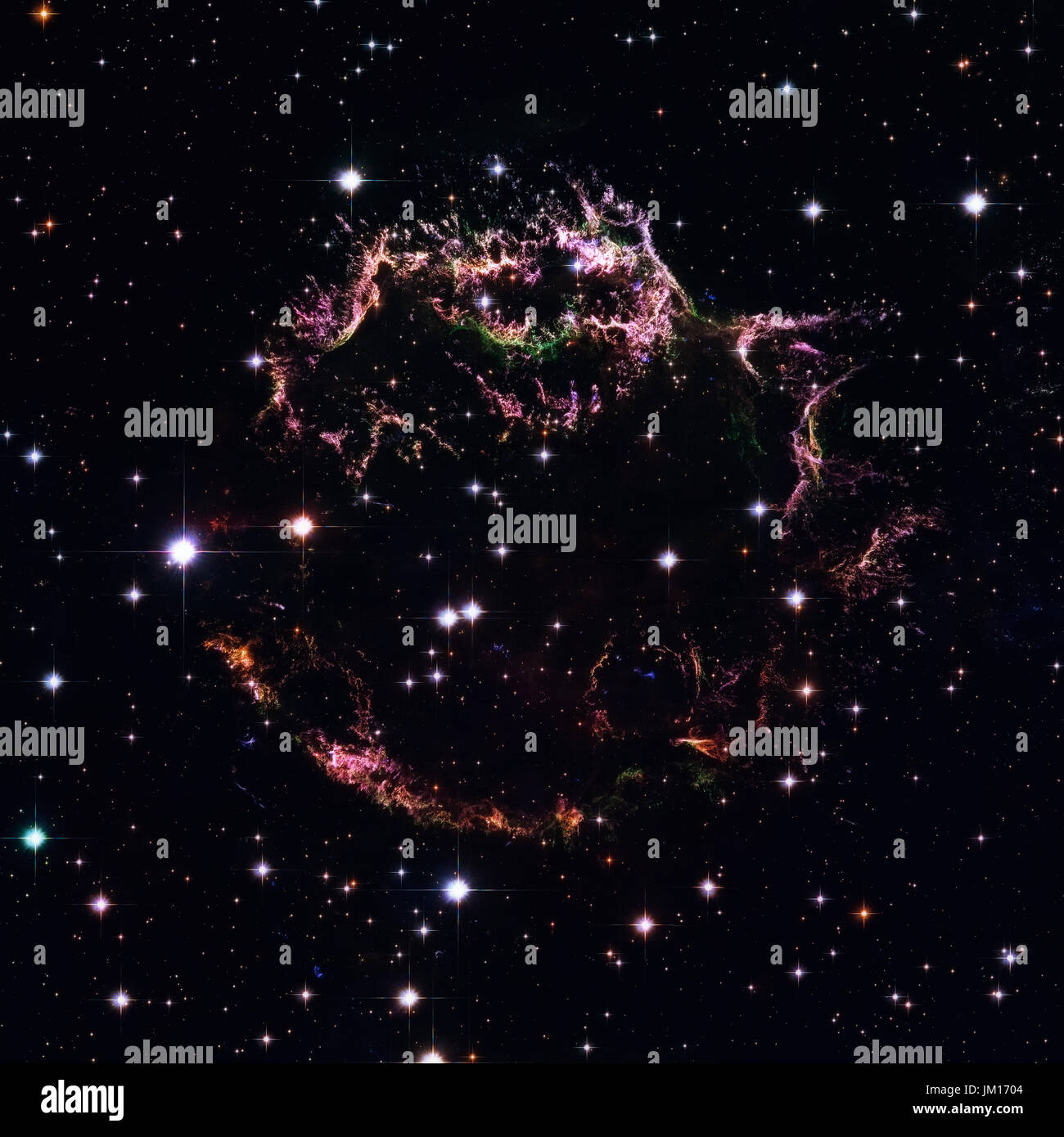 The tattered remains of a supernova explosion known as Cassiopeia A. It is the youngest known remnant from a supernova explosion in the Milky Way. Ele Stock Photo