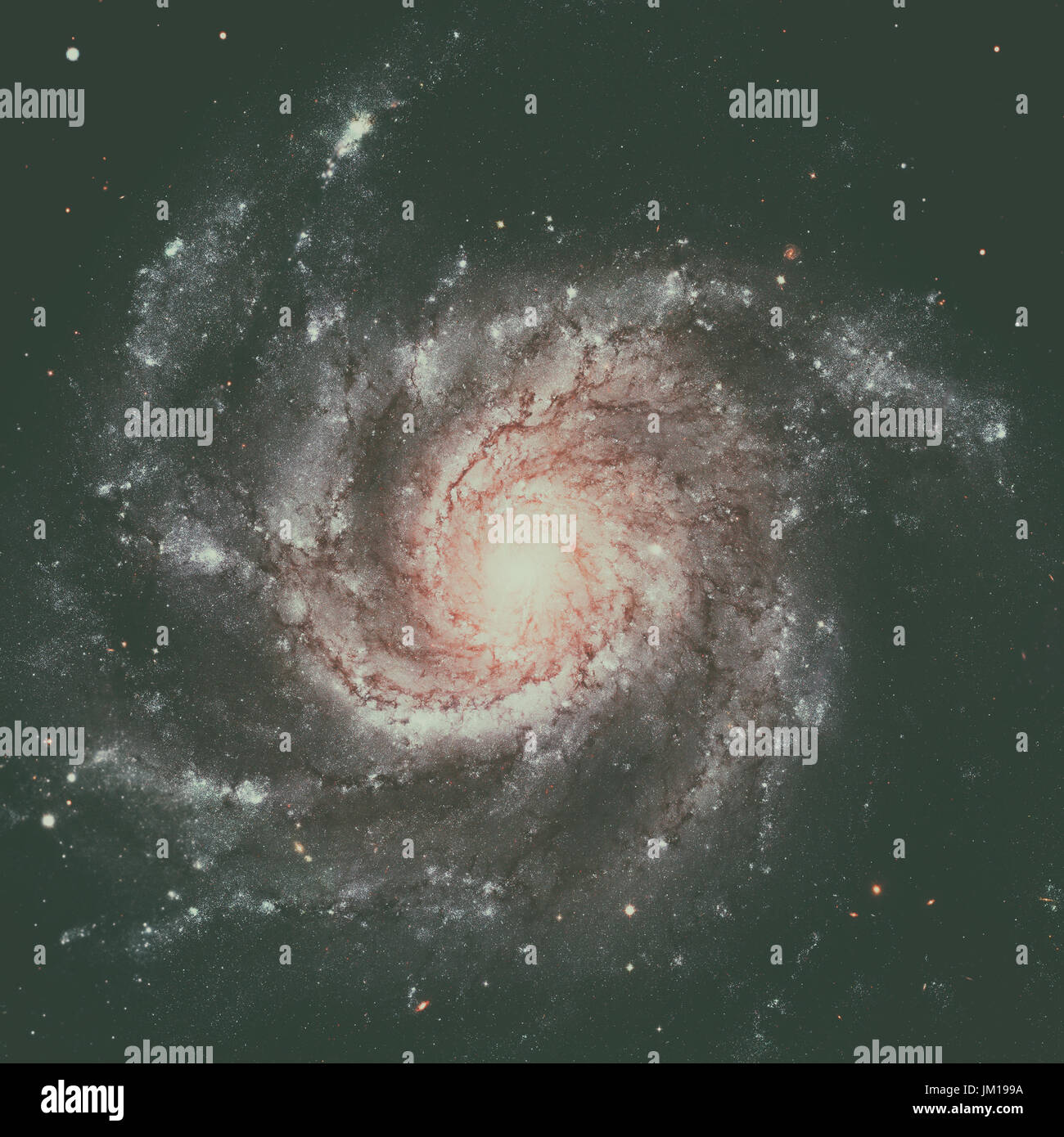 The Pinwheel Galaxy, also known as Messier 101, M101 or NGC 5457, is a face-on spiral galaxy in the constellation Ursa Major. Elements of this image f Stock Photo