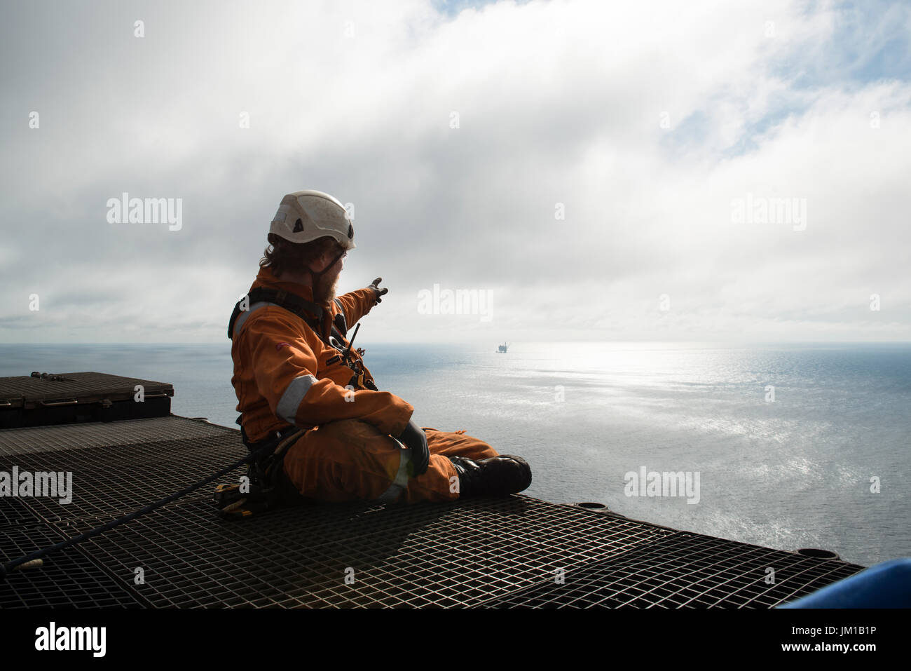 ACN rope access IRATA Workers on the BP Miller oil and gas rig, in the north sea,  - decommissioning project. credit: LEE RAMSDEN / ALAMY Stock Photo