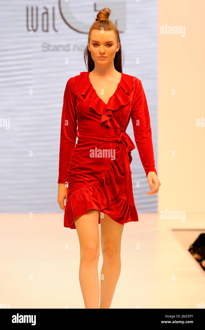 Fashion model wearing a dress by Wal-G on the Spirit Catwalk at Pure London, Olympia, London, UK. Pure London, the UK's leading trade fashion exhibition opened its doors 23-25th July 2017, featuring two halls of trade stands from leading fashion and accessories designers, lectures from industry experts, and fashion shows on two different catwalks throughout each day. Fashion buyers were out in force to see the new season's collections. 25th July 2017. Credit: Antony Nettle/Alamy Live News Stock Photo