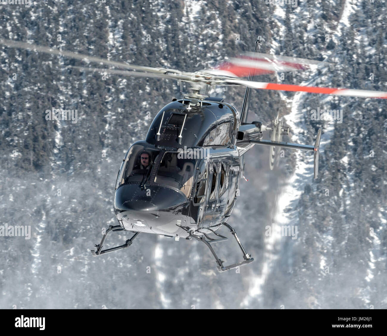 Landing at Courchevel Heliport an elegant Bell 429 GlobalRanger Stock Photo