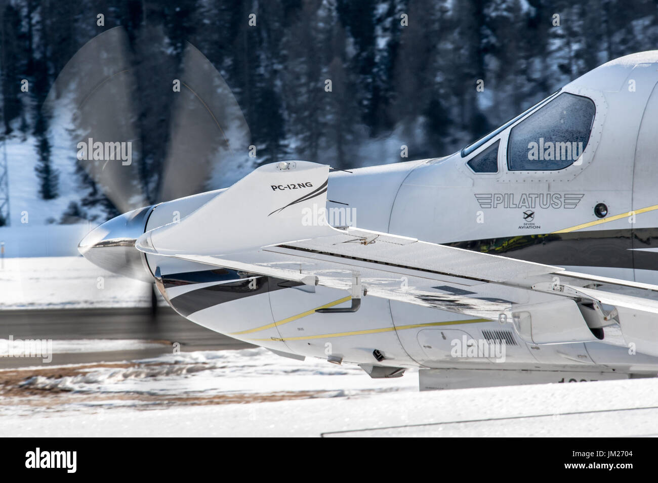 Detailed Pilatus  PC12 taxiing from Snow Parking of Samedan Engadin Airport. St.Moritz Swiss Stock Photo