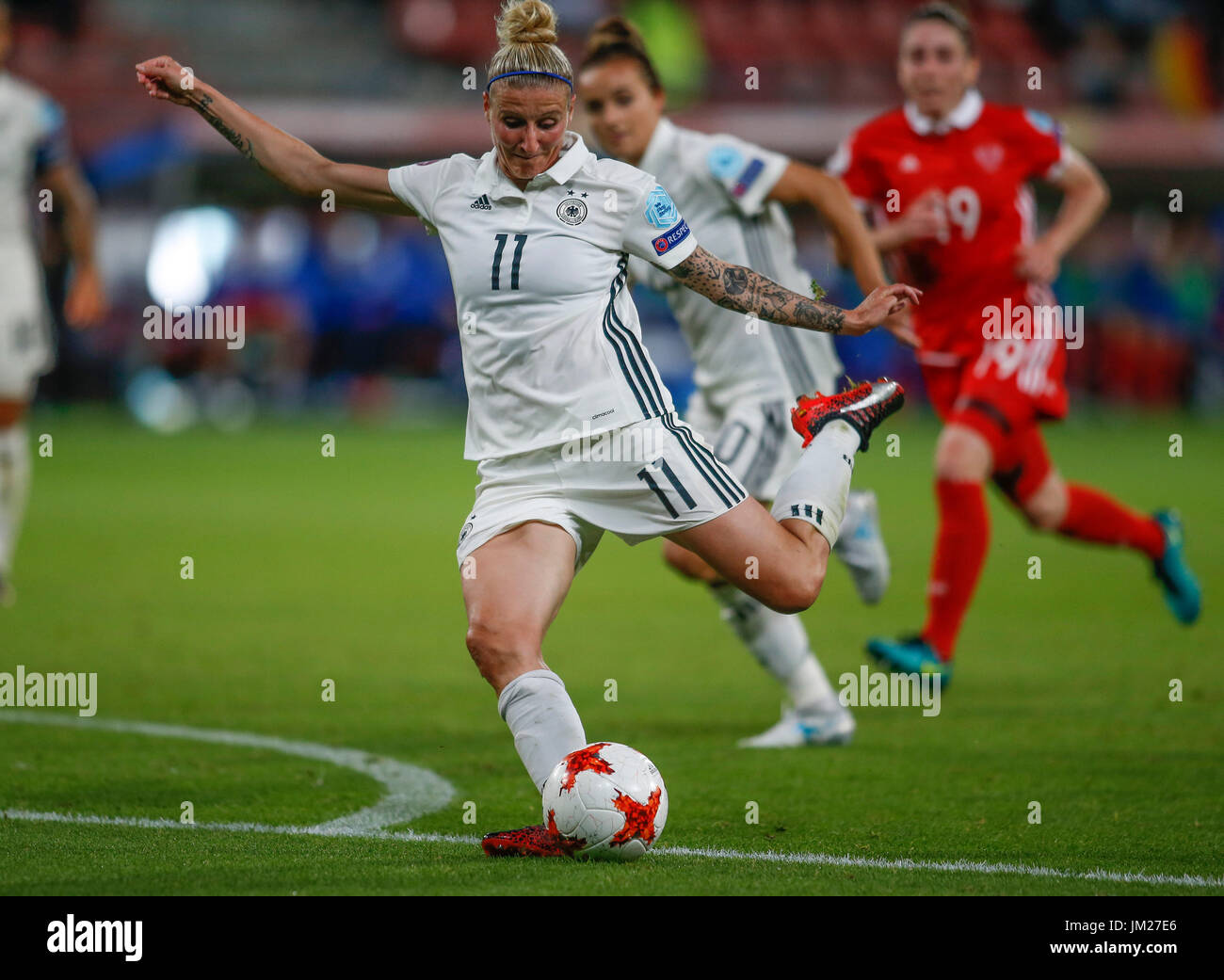 Utrecht, Netherlands. 25th July, 2017. Anja Mittag (front) of Germany shoots during the UEFA Women's EURO 2017 soccer tournament Group B match between Germany and Russia in Utrecht, the Netherlands, July 25, 2017. Germany won 2-0. Credit: Ye Pingfan/Xinhua/Alamy Live News Stock Photo