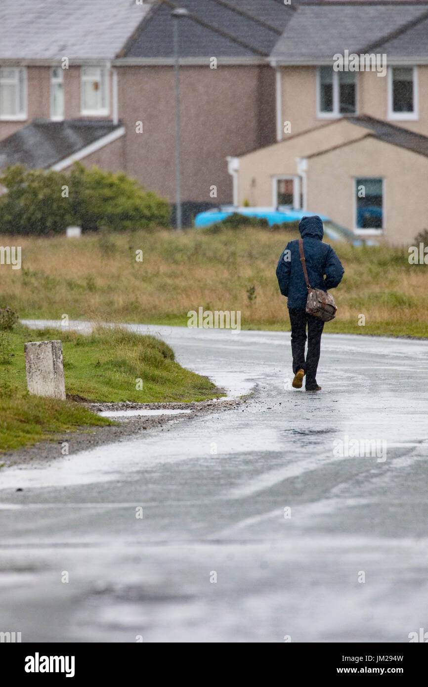 Man walking down country lane hi-res stock photography and images - Alamy