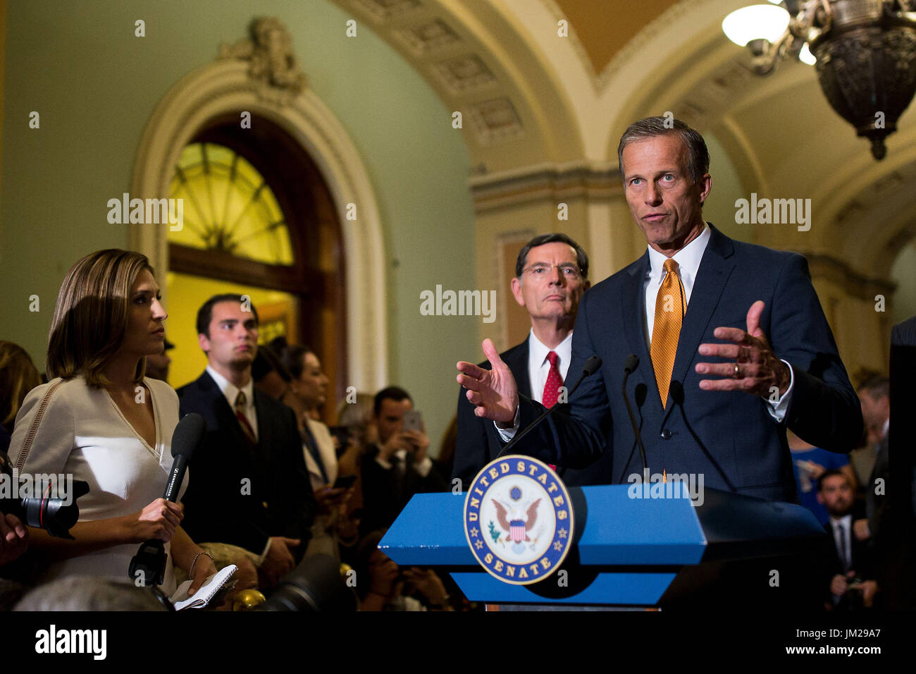 Washington, USA. 25th July, 2017. U.S. Senator John Thune (1st R) speaks at a press conference after voting on Capitol in Washington, DC, the United States, on July 25, 2017. The U.S. Senate on Tuesday voted 51-50 to begin a debate on proposals to end Obamacare, as Republicans rallied again to fulfill their seven-year-long promise. Credit: Ting Shen/Xinhua/Alamy Live News Stock Photo