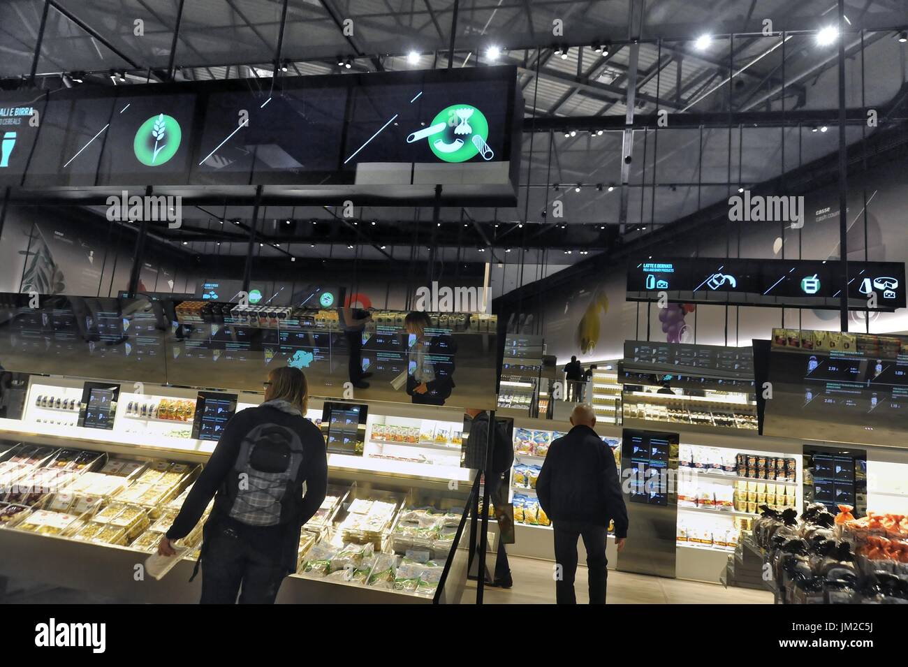 Future Food District, the supermarket of the future, made by Coop, the League of Italian Cooperatives. Presented for the first time at Milan's World Expo 2015, and then reopened in 2016 in the Bicocca district. Customers can experiment and try new ways to shop: large touch-screen high-tech monitors show additional product information, including the origin, nutritional values, the possible presence of allergenic ingredients, instructions for disposal and related products. Fundamental Issues related to food, shopping and sustainability Stock Photo