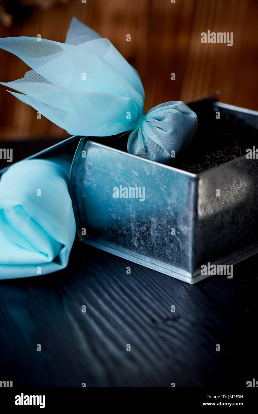 silk tea bag. Next tin with a large leaf black tea. The emergence of