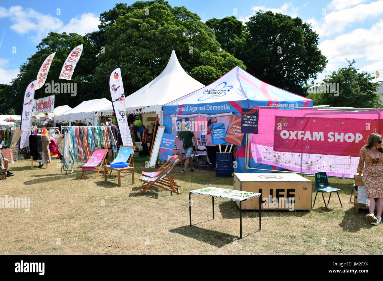 Latitude Festival 2017, Henham Park, Suffolk, UK. United Against Dementia stall & Oxfam shop Stock Photo