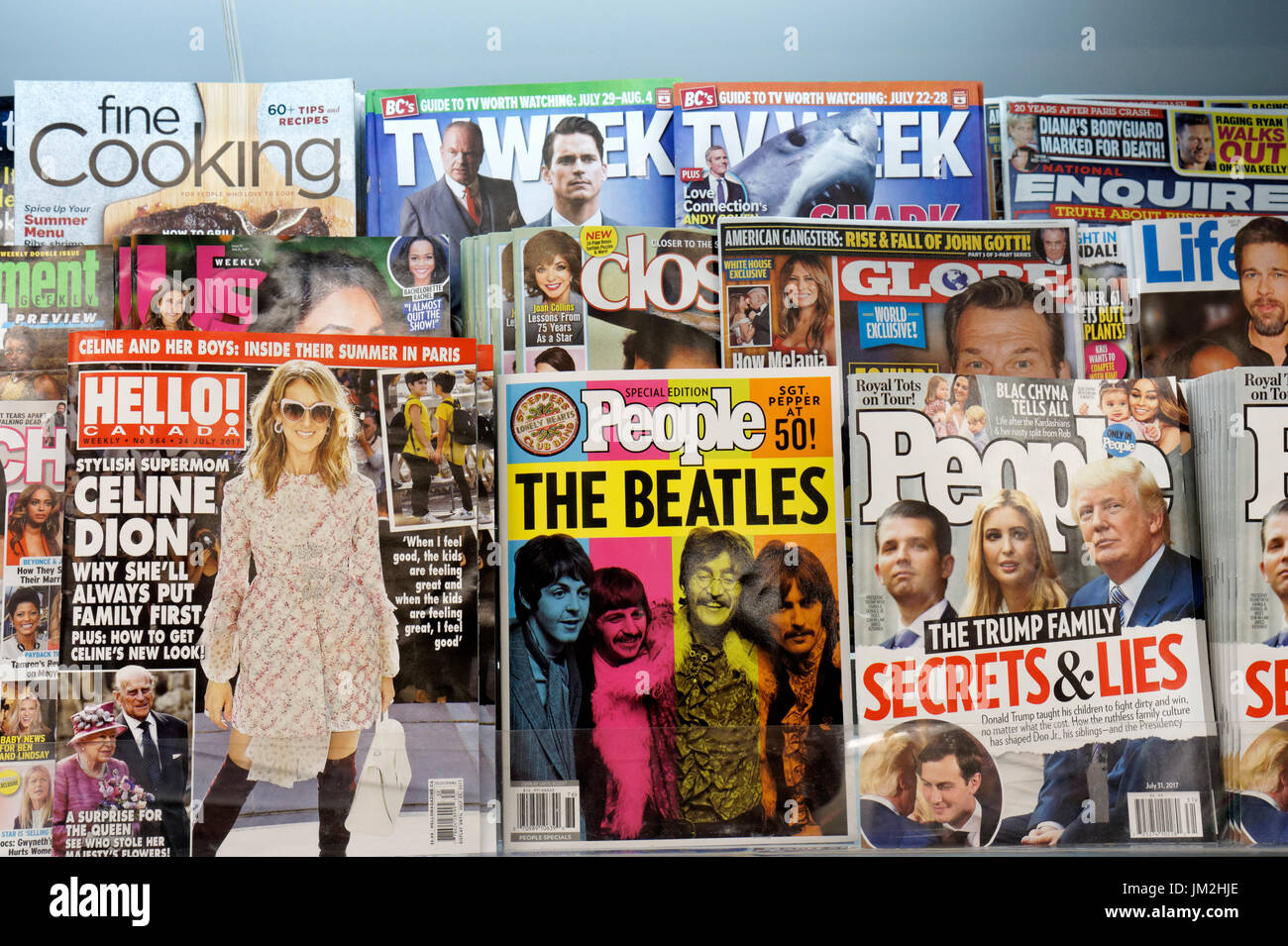 English language 2017 gossip and entertainment magazines and tabloids displayed on a magazine rack in a store, Vancouver, British Columbia, Canada Stock Photo