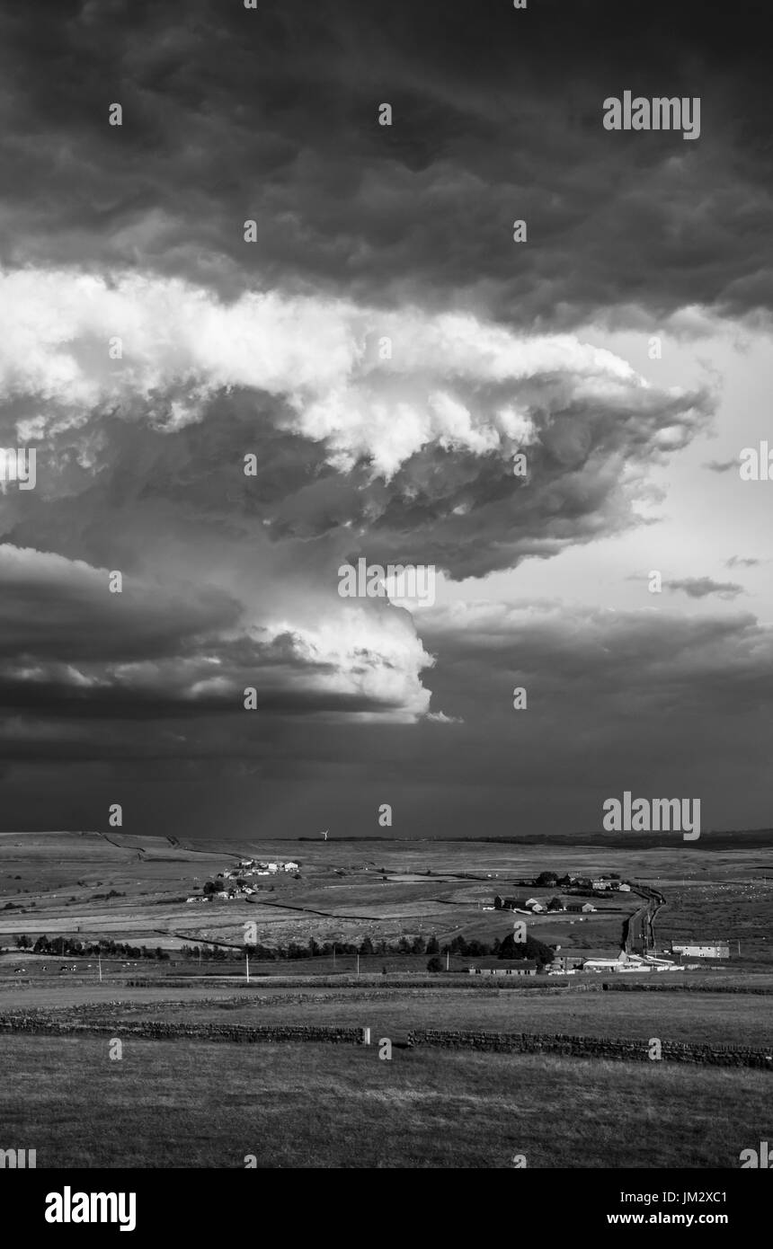 Moody dramatic skies over the yorkshire moors near haworth stock image