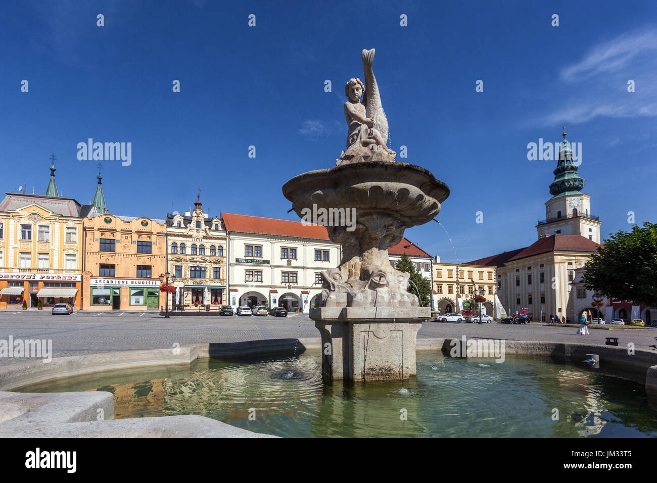 Main square Kromeriz Old Town with baroque fountain Kromeriz Archbishop palace in the background, Kromeriz Czech Republic town scenery Stock Photo