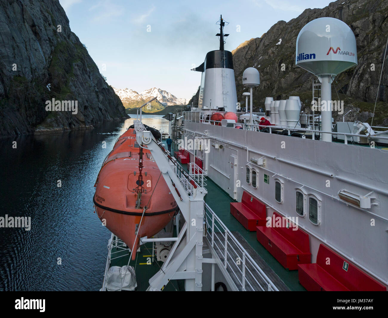 Small cruise ship turning in amazing narrow Trollfjord sidearm of ...