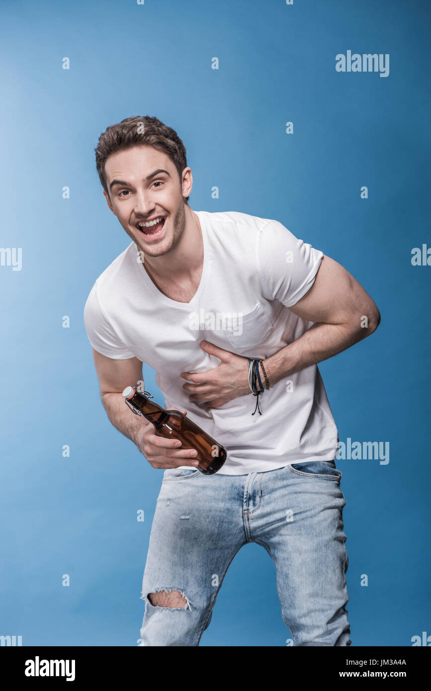Man stand laughing hi-res stock photography and images - Alamy