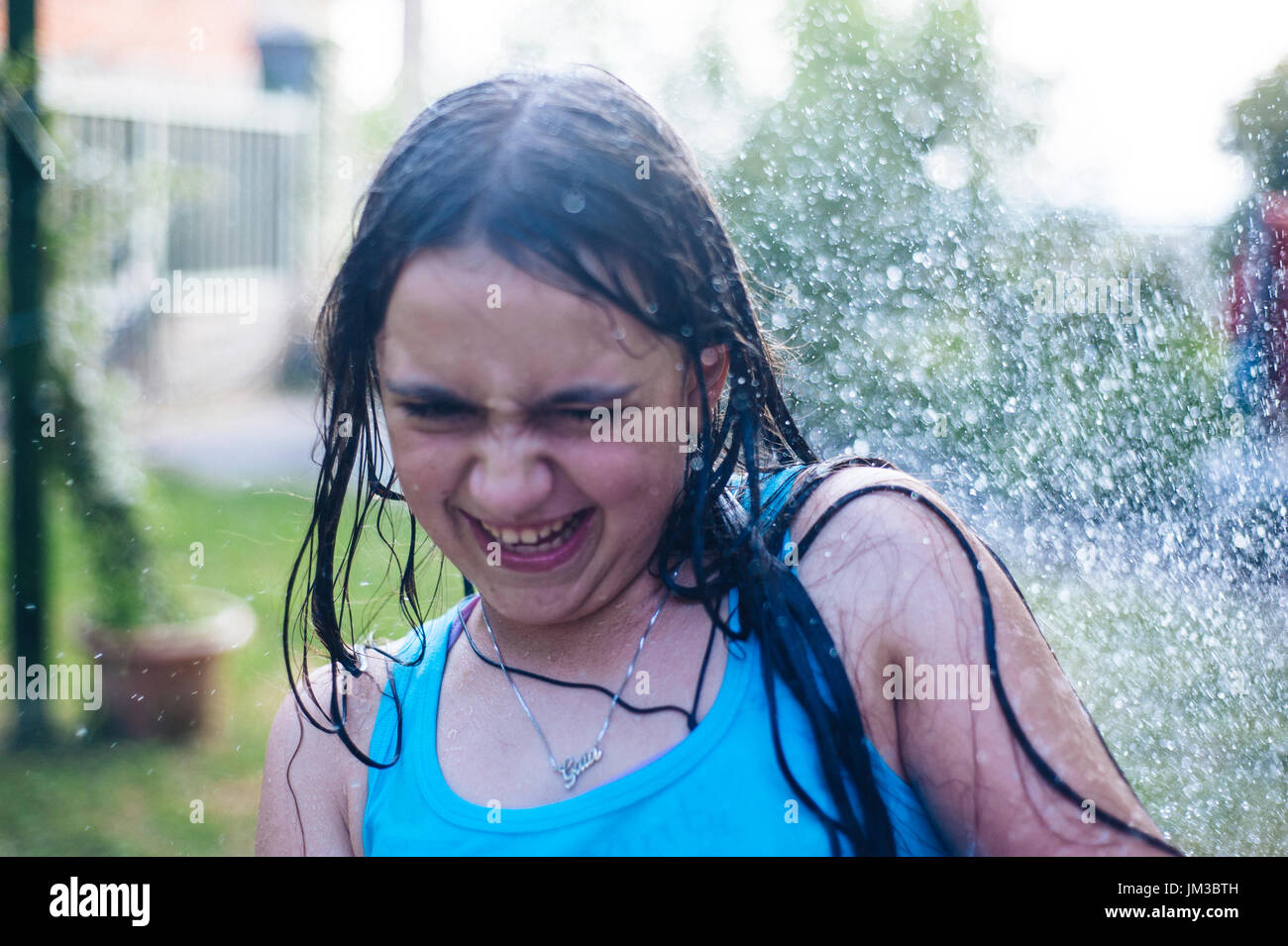 Kids play with water guns Stock Photo Alamy