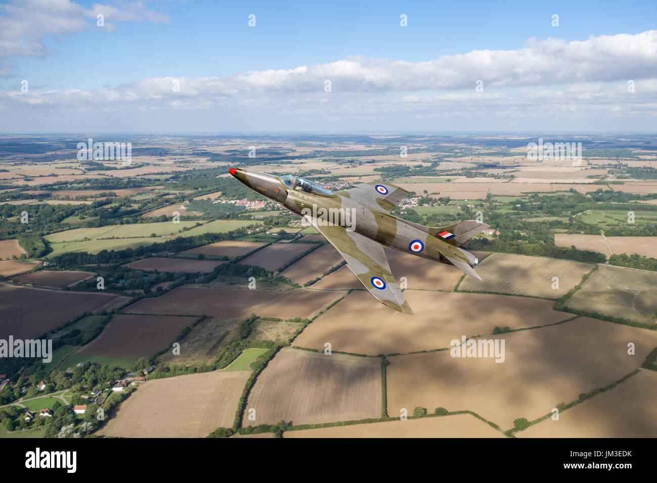 My depiction of the only surviving Supermarine Swift F4, WK275, in flight over the English countryside. The restored (non-flying) airframe currently s Stock Photo